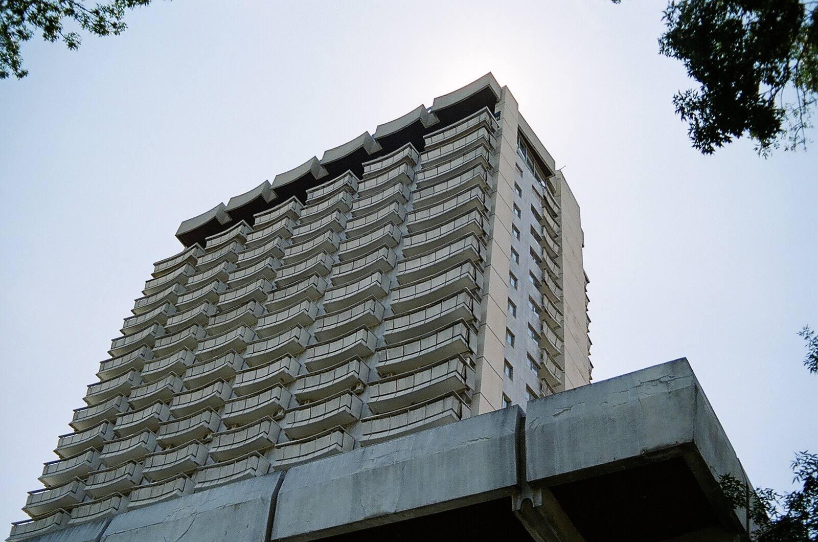 Brutalist slab hotel from below