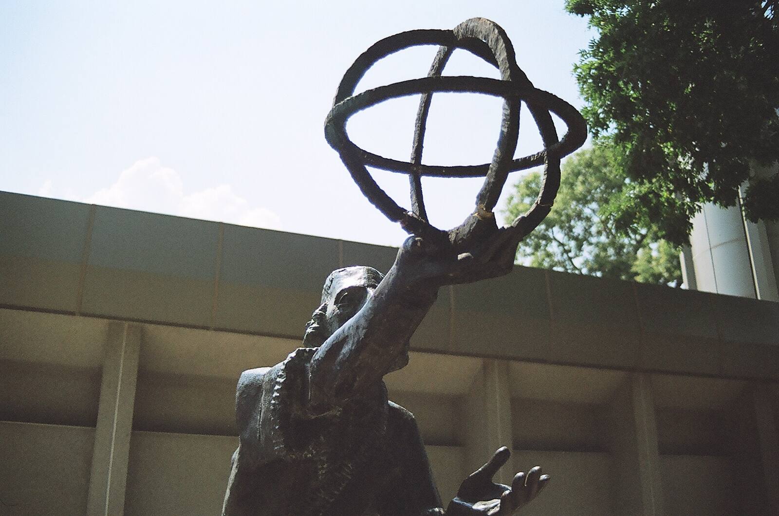 Copernicus statue holding an armillary sphere