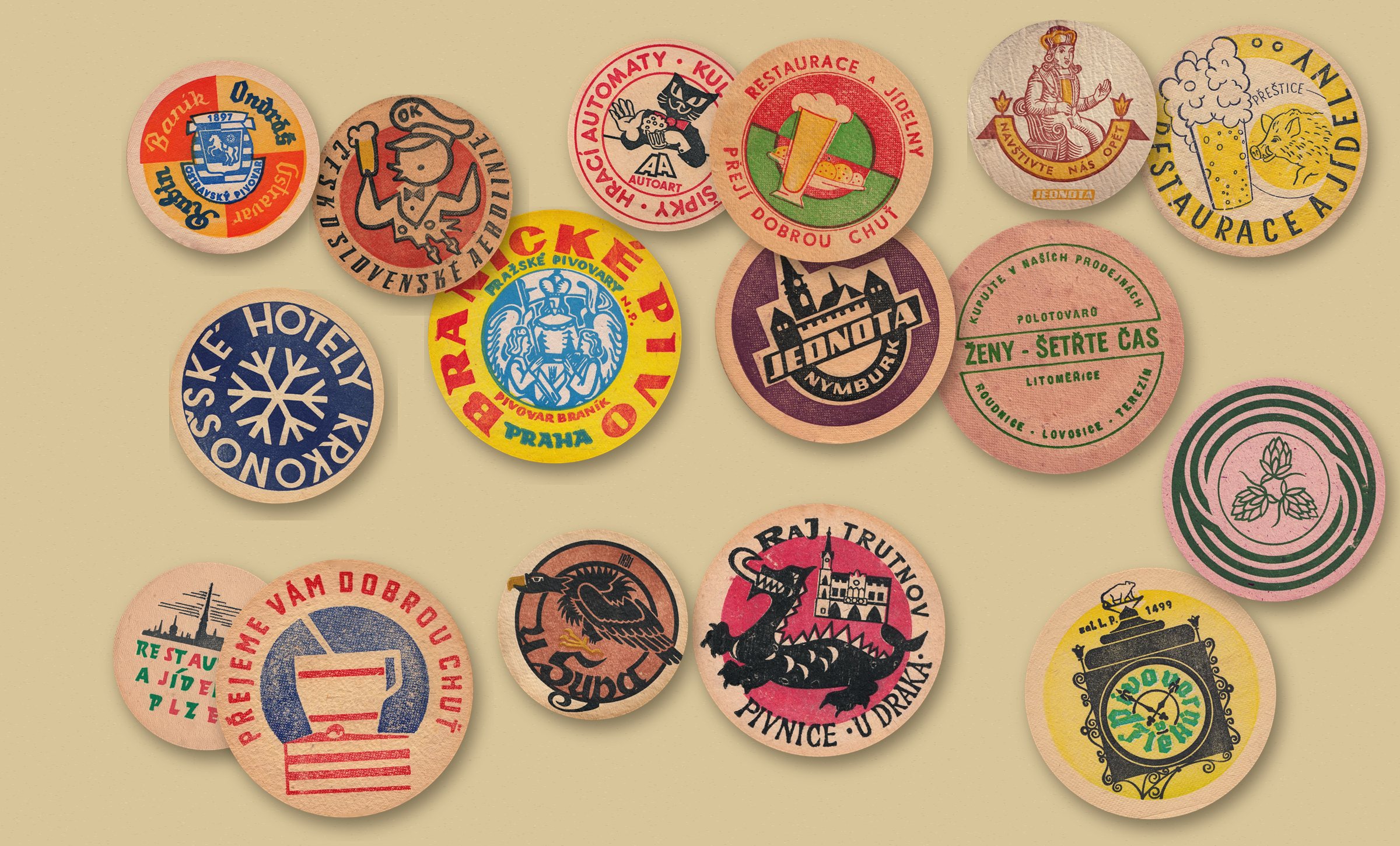 Communist-era Czechoslovak beer mats on kraft paper