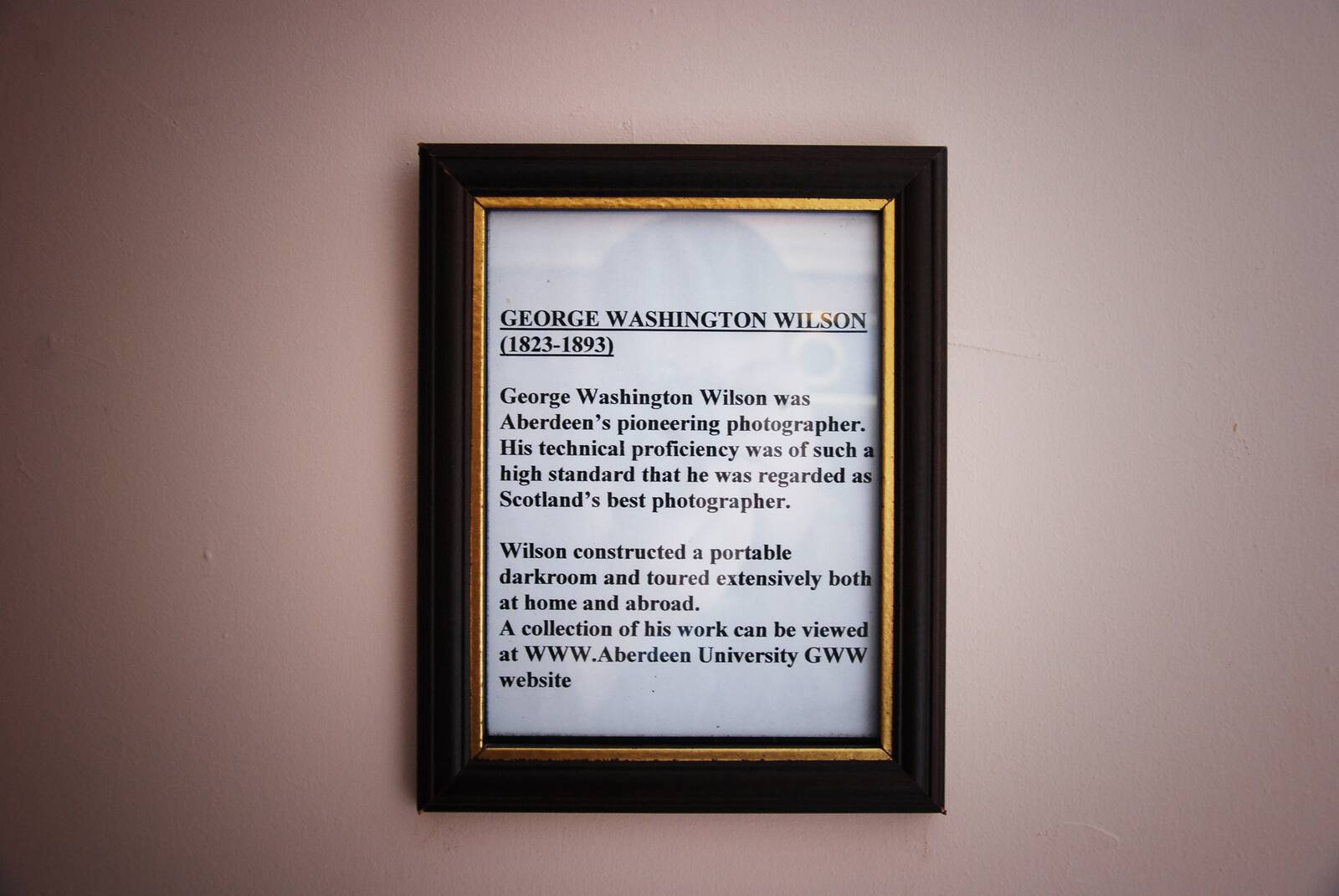 Framed text about photographer George Washington Wilson