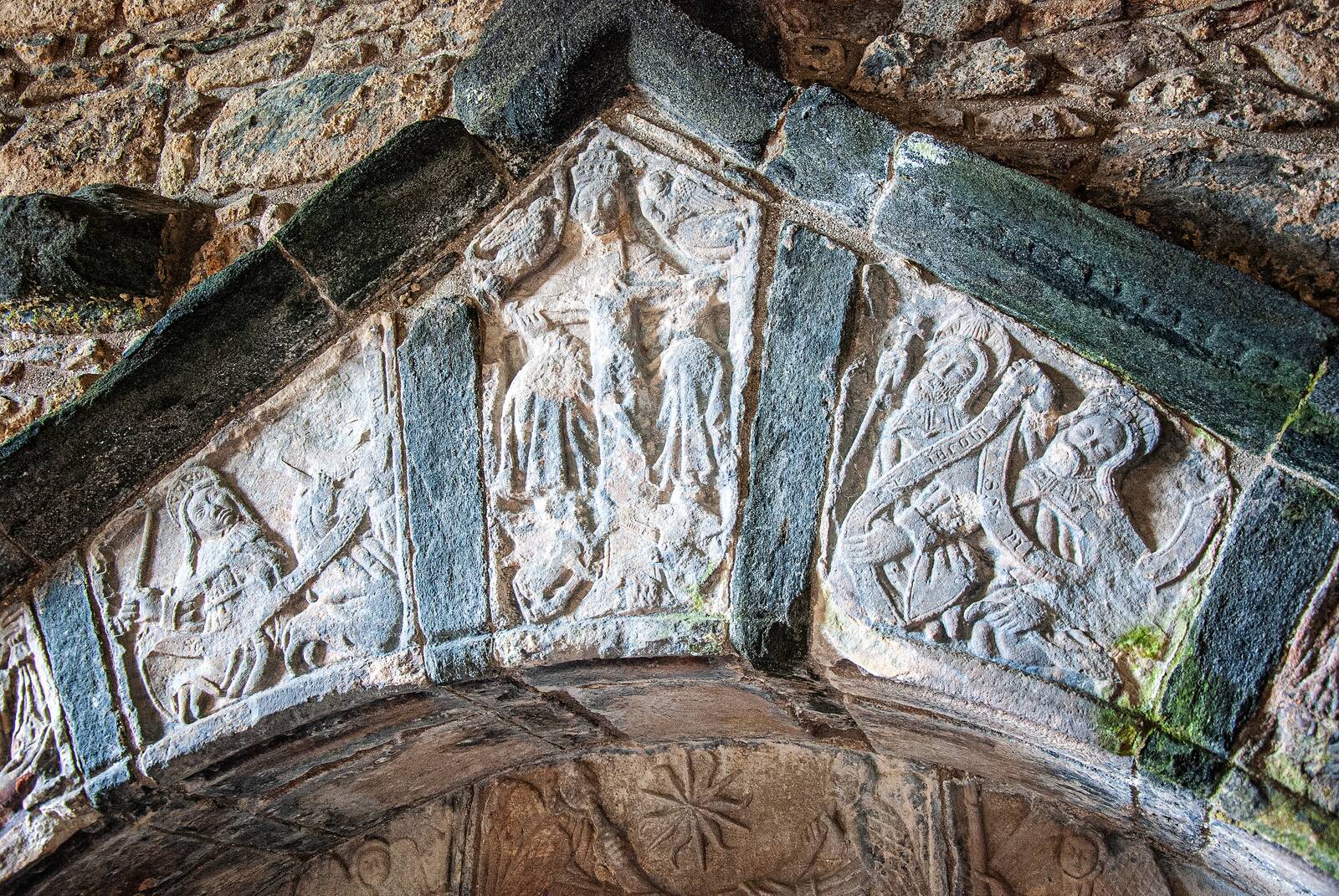Saint and censer, bishop and crook — the full medieval cast, in Lewisian gneiss.